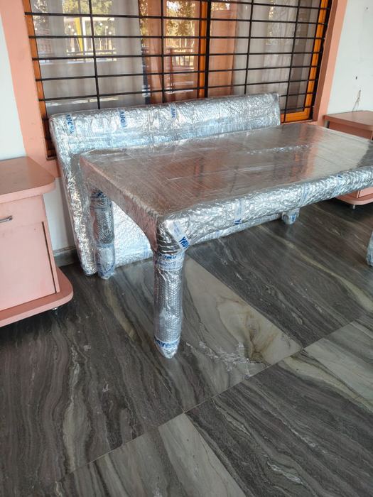 Wooden furniture wrapped in bubble wrap by Vedanta Cargo and Movers Jaipur